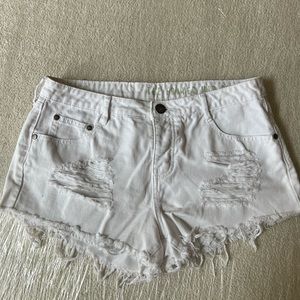 The Frayed Mid Rise White Denim Short